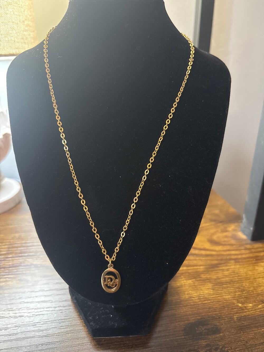 vintage Christian Dior gold-tone oval pendant necklace w/an interlocking Dior